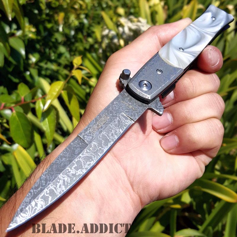 If you are looking 9" TAC FORCE Italian Stiletto Damascus Spring Open Assisted Pocket Knife Pearl you can buy to blade_addict, It is on sale at the best price